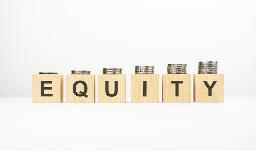 Wooden blocks that spell out equity under stacks of coins.