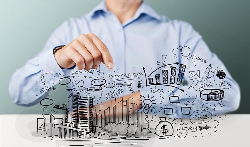 An EB5 investor who applied for a green card through investment in real estate, behind a hand-drawn image of a real estate project.