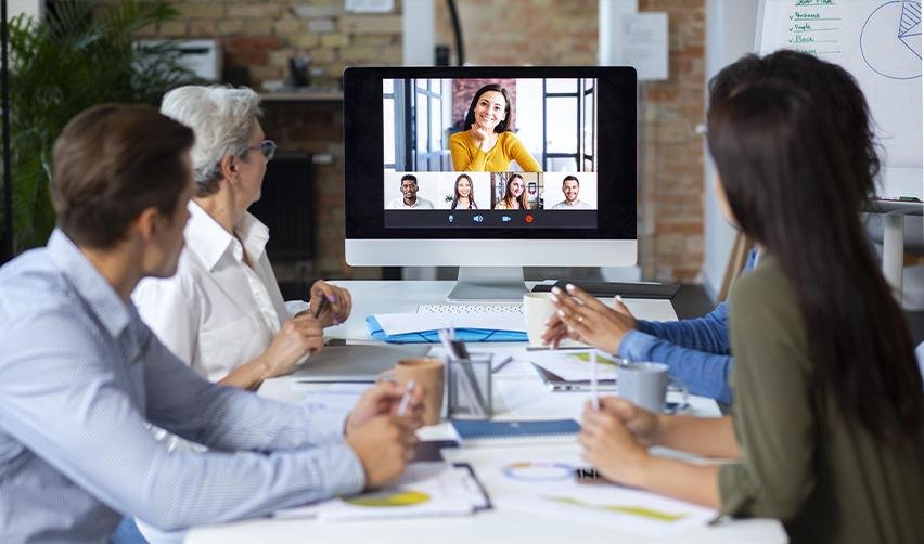 Team participating in a virtual EB5 industry webinar, highlighting collaboration, education, and staying updated on EB5 program insights and investment opportunities.