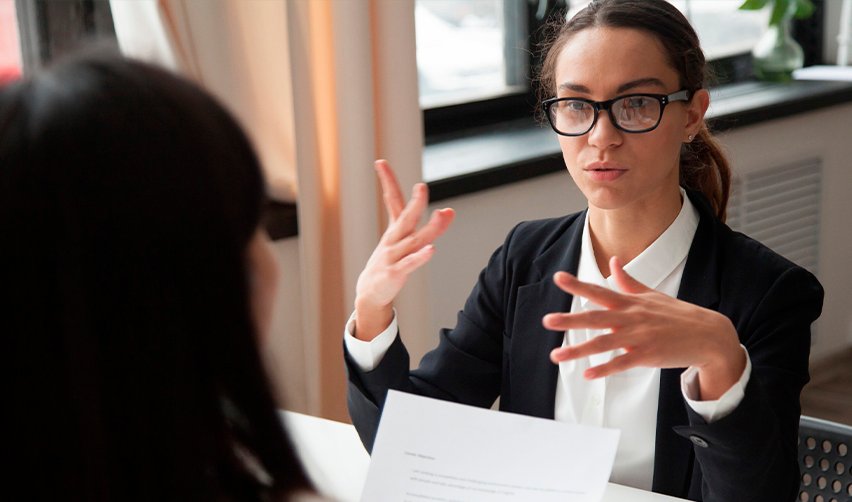 Professional regional center advisor explaining EB5 investment details during a consultation, illustrating the structured support available to investors through reputable EB5 firms like EB5AN.